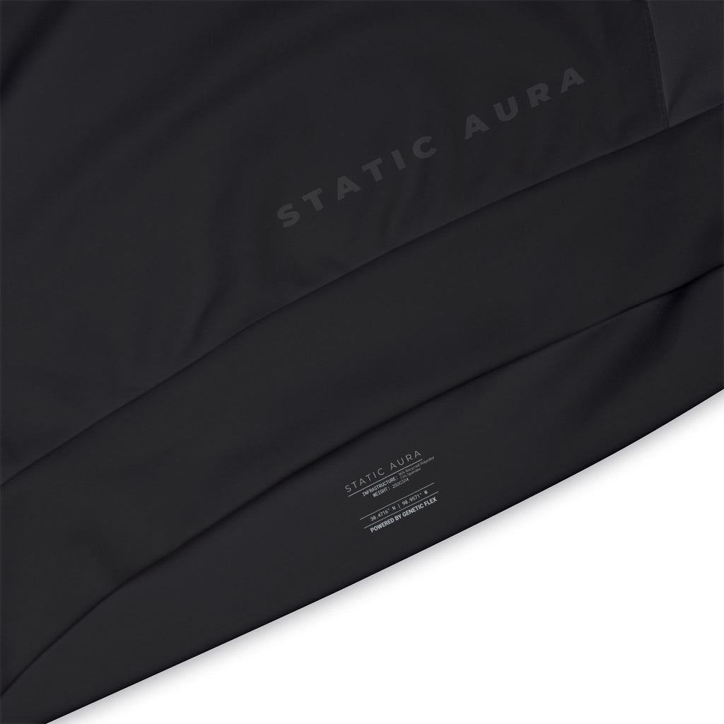 Black fabric with 'STATIC AURA' branding on a white background